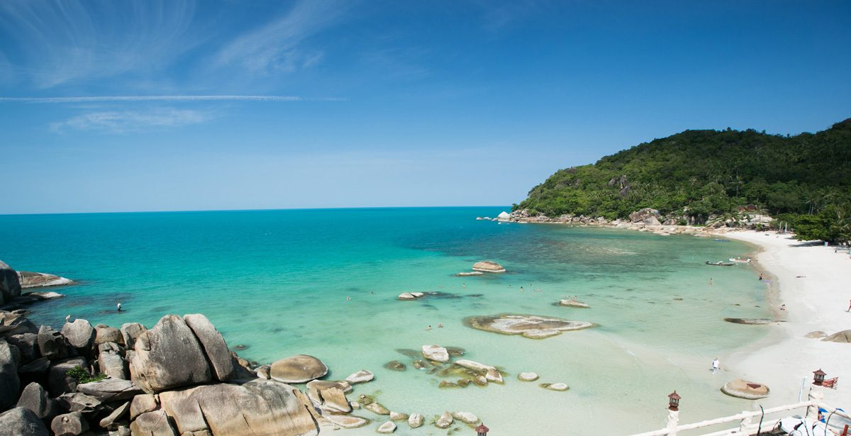 Crystal Bay wide panoramic view with granite boulders and clear water